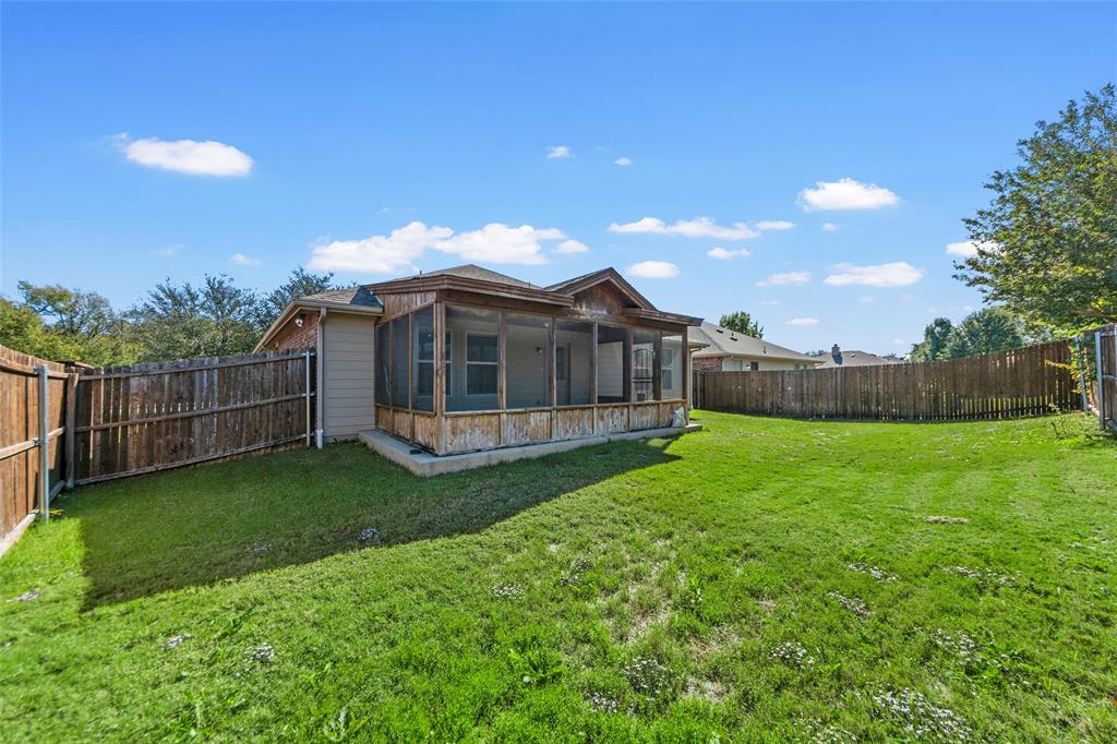 716 Harrison Lane Lavon, TX 75166 - Photo 33 of 40 a view of a house with backyard and porch