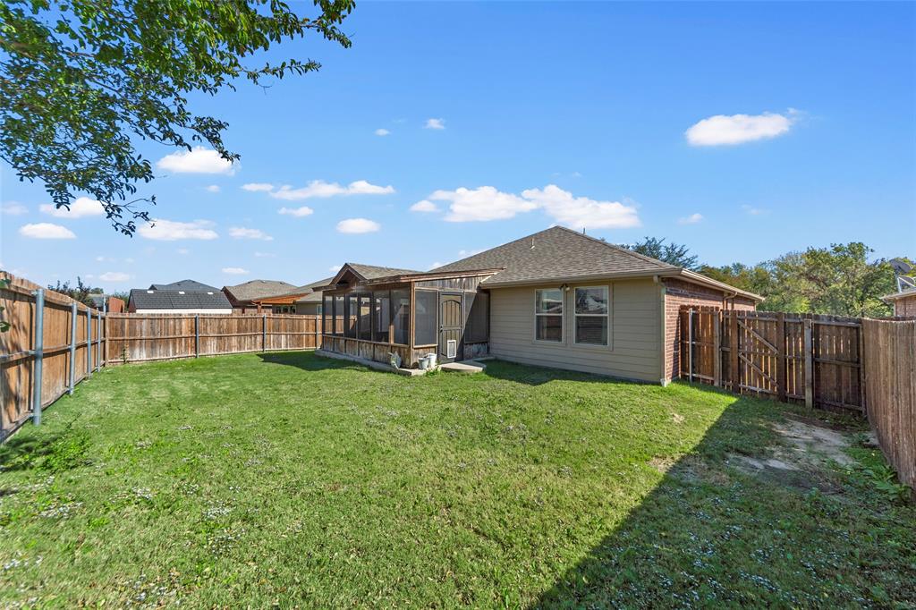 716 Harrison Lane Lavon, TX 75166 - Photo 34 of 40 a house view with a garden space