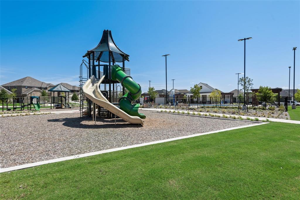 716 Harrison Lane Lavon, TX 75166 - Photo 35 of 40 a view of a park with a slide