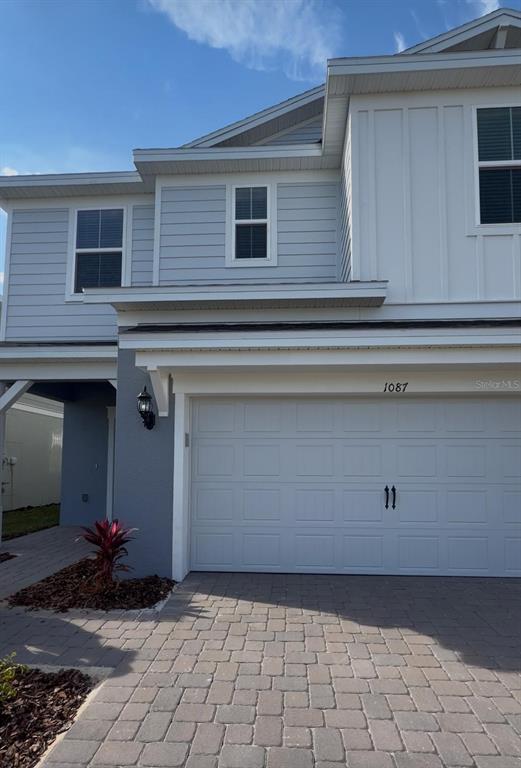 1087 Ocean Pk Road Clermont, FL 34714 - Photo 1 of 1 a view of backyard and chair