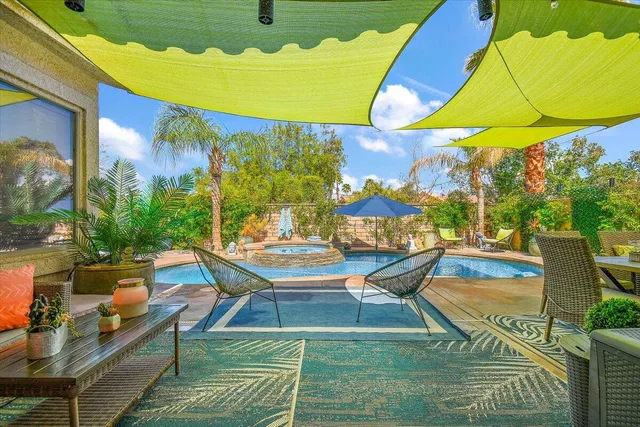 a outdoor living space with furniture and a potted plant