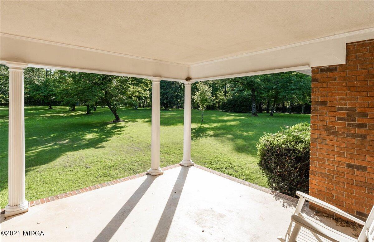 455 Lite-N-Tie Road Gray, GA 31032 - Photo 2 of 47 a view of a backyard with garden