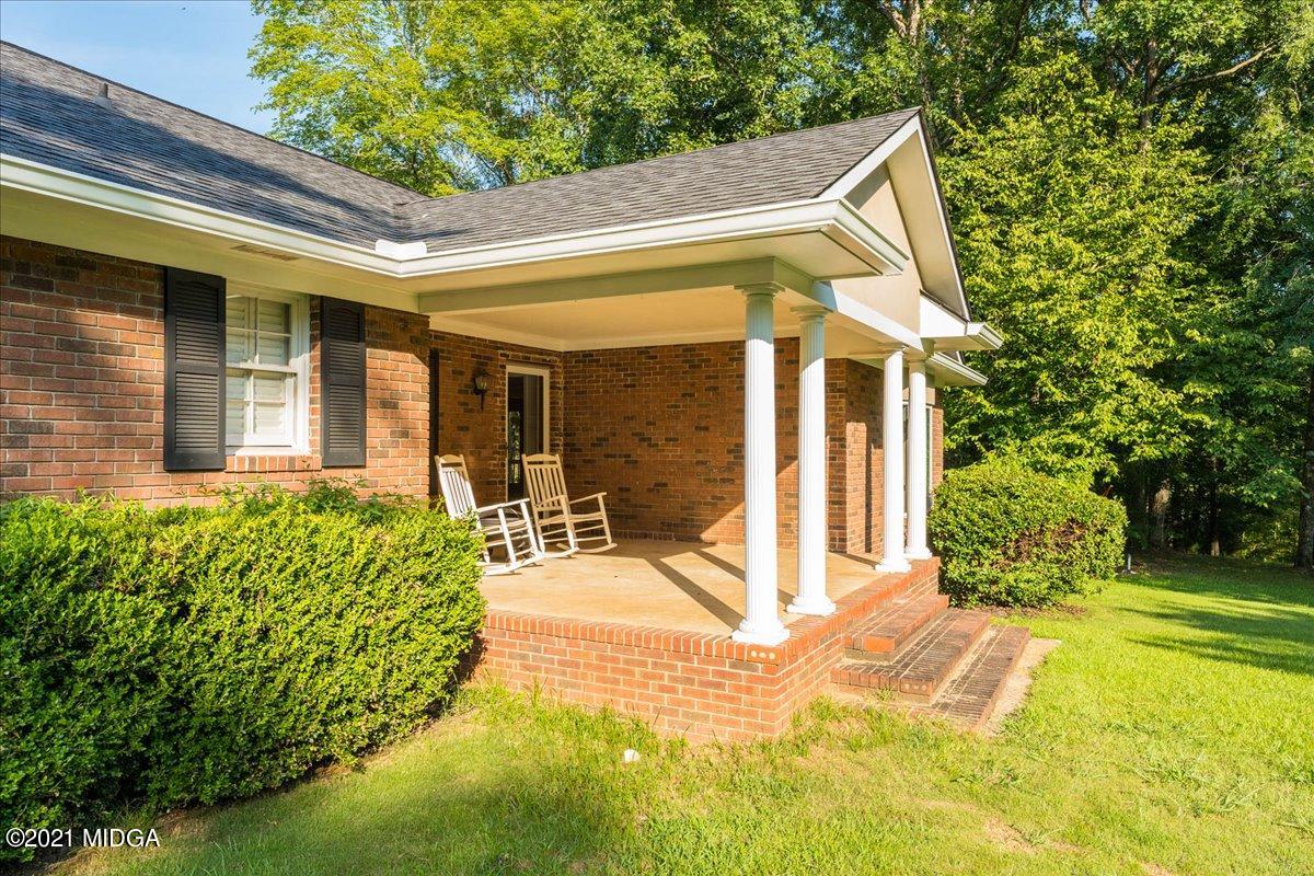 455 Lite-N-Tie Road Gray, GA 31032 - Photo 3 of 47 a view of a house with a patio