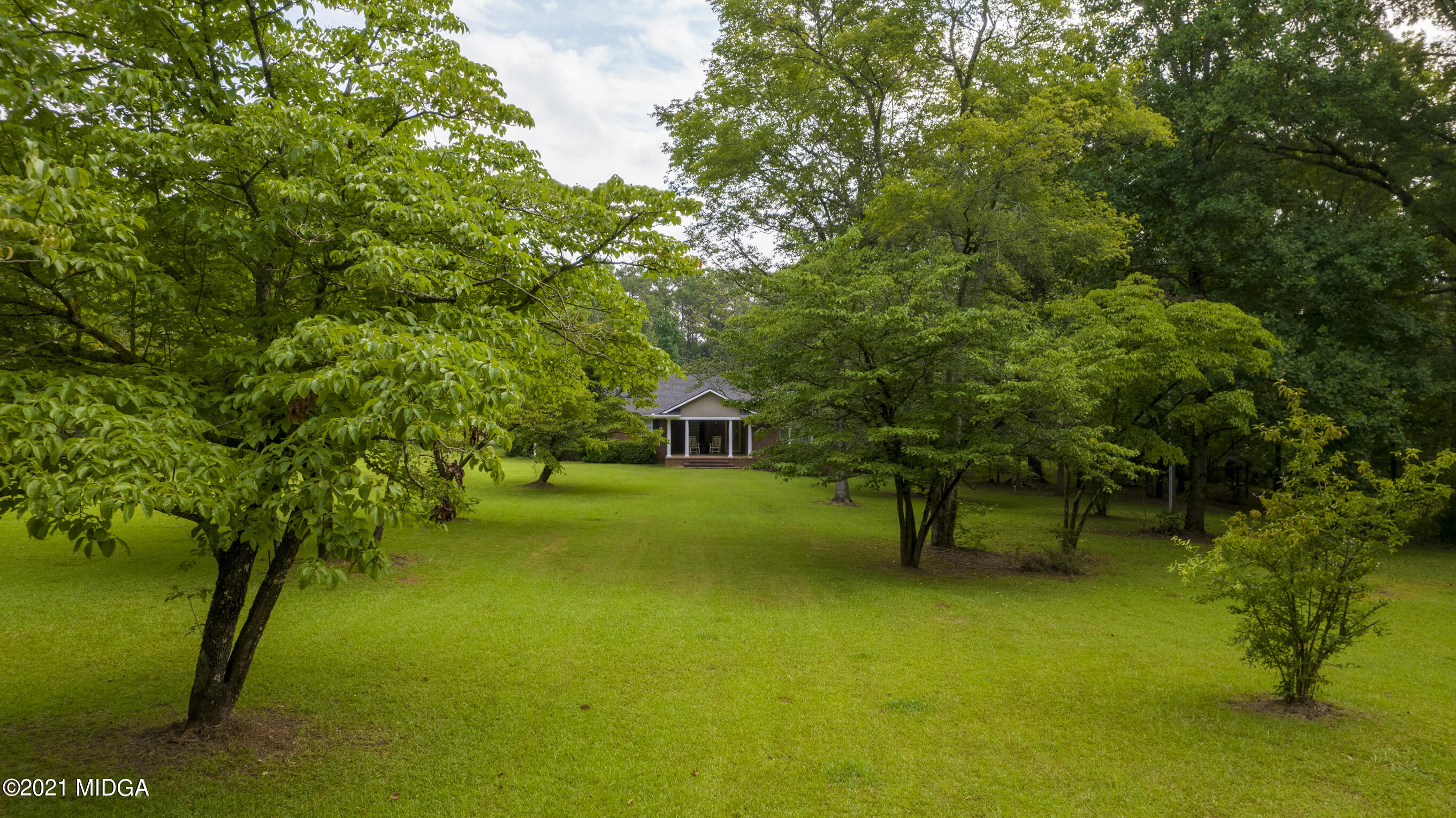 455 Lite-N-Tie Road Gray, GA 31032 - Photo 39 of 47 a view of a house with a backyard