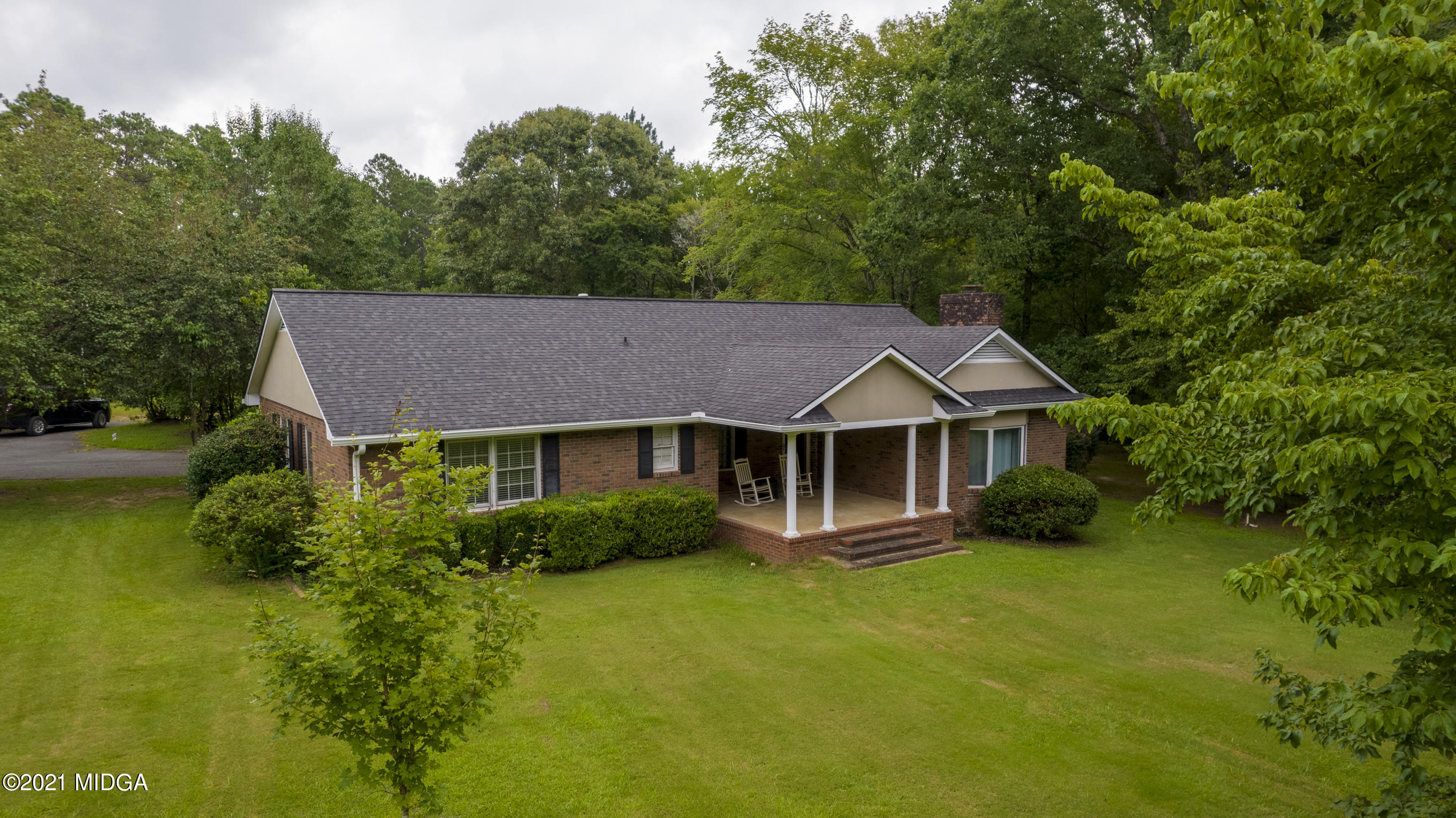 455 Lite-N-Tie Road Gray, GA 31032 - Photo 46 of 47 a aerial view of a house with swimming pool next to a yard