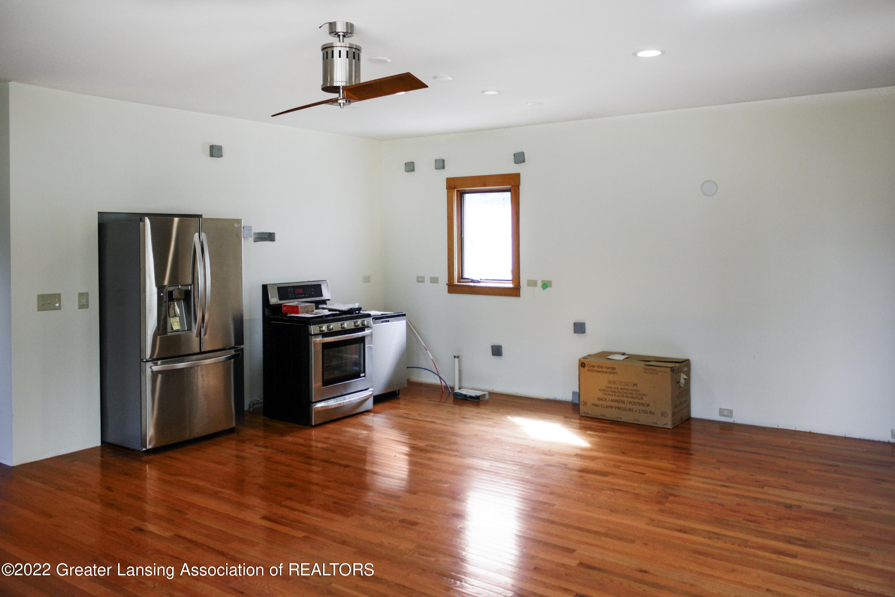 4215 Hulett Road Okemos, MI 48864 - Photo 25 of 46 Great Room with Kitchen Appliances