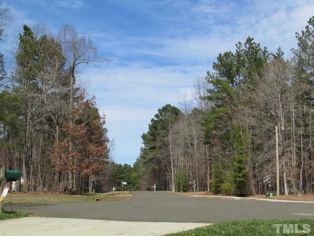 216 Piney Forest Road Roxboro, NC 27574 - Photo 21 of 23 From the front porch you can sit and watch anyone coming to visit as you can see in the street approach. Great cul-de-sac lot