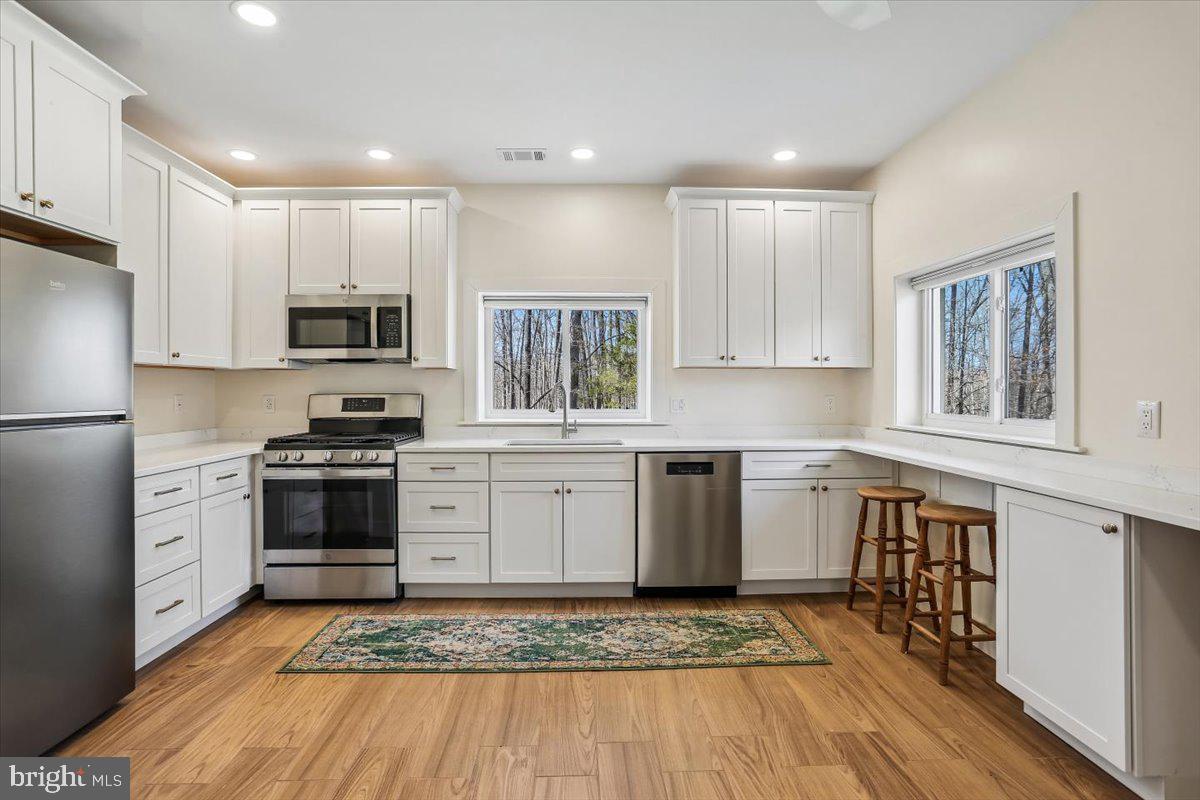 24875 Old Hundred Road Dickerson, MD 20842 - Photo 12 of 47 Gorgeous Kitchen with Quartz Counters
