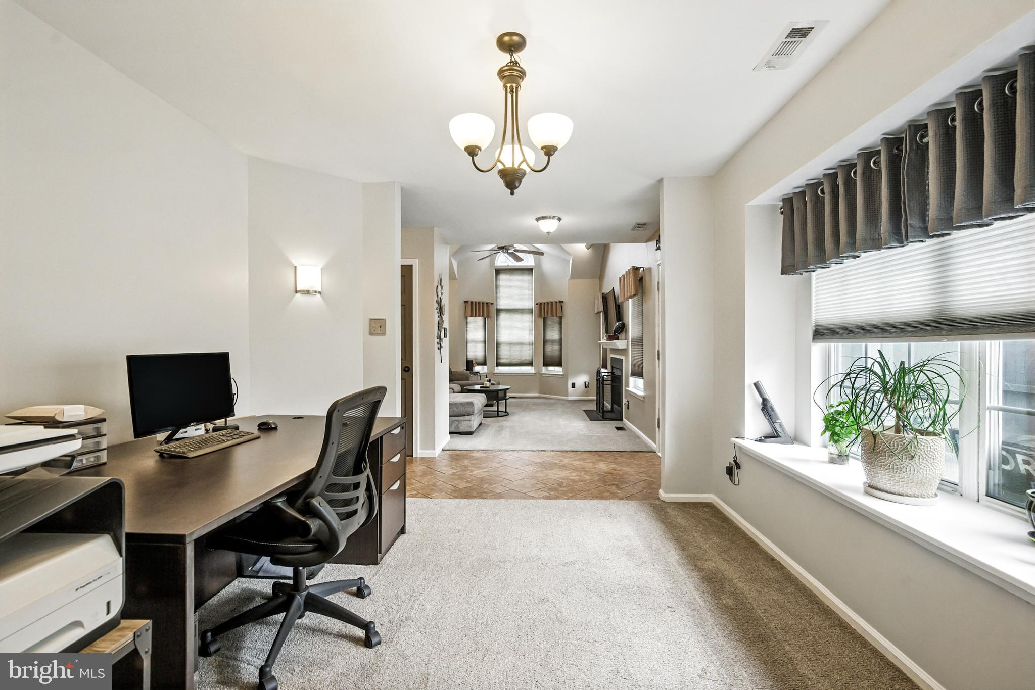 86 Pondview Lane Sicklerville, NJ 08081 - Photo 11 of 35 a view of a dining room with furniture window and wooden floor