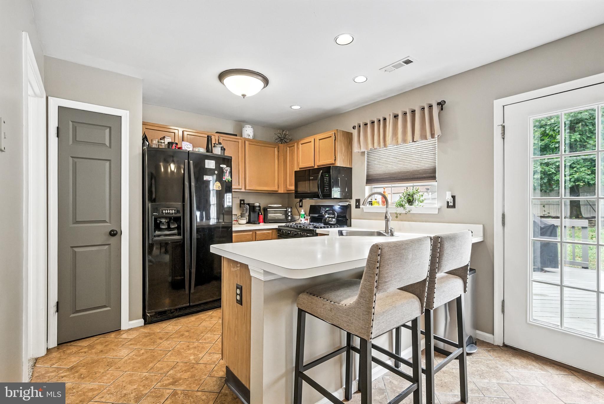 86 Pondview Lane Sicklerville, NJ 08081 - Photo 15 of 35 a kitchen with stainless steel appliances granite countertop a refrigerator and a stove top oven