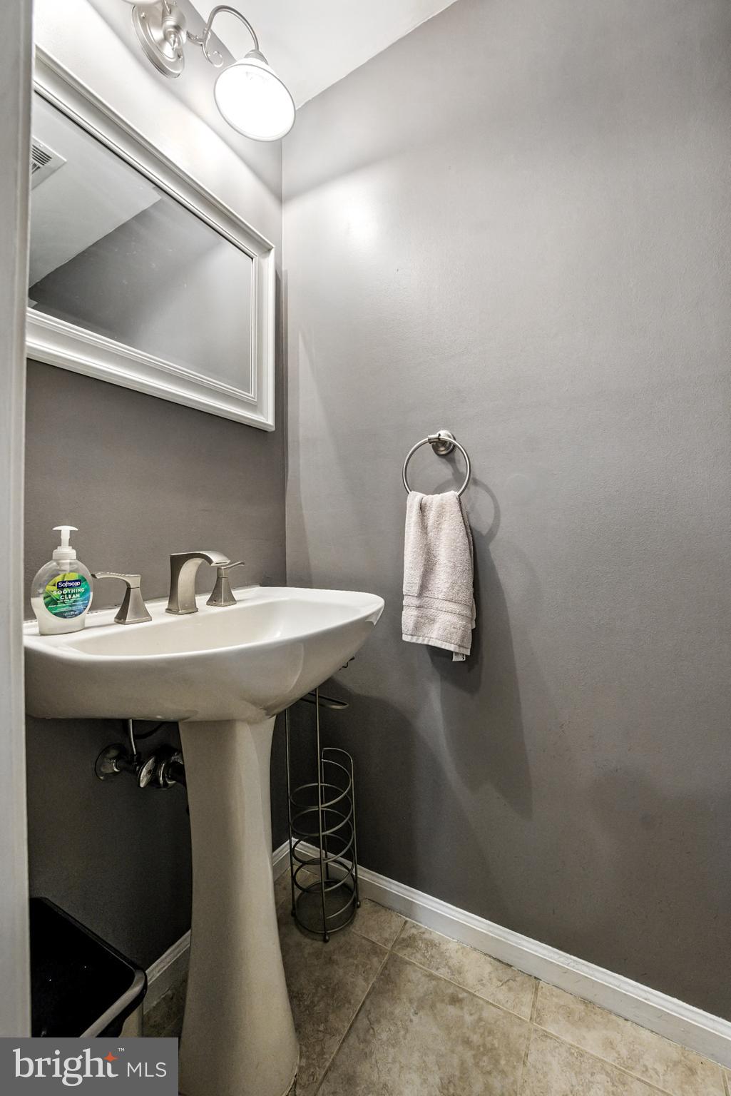 86 Pondview Lane Sicklerville, NJ 08081 - Photo 20 of 35 a bathroom with a sink and mirror
