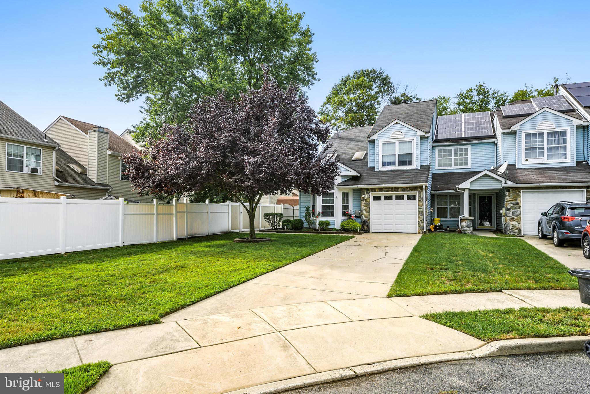 86 Pondview Lane Sicklerville, NJ 08081 - Photo 2 of 35 a front view of a house with a yard