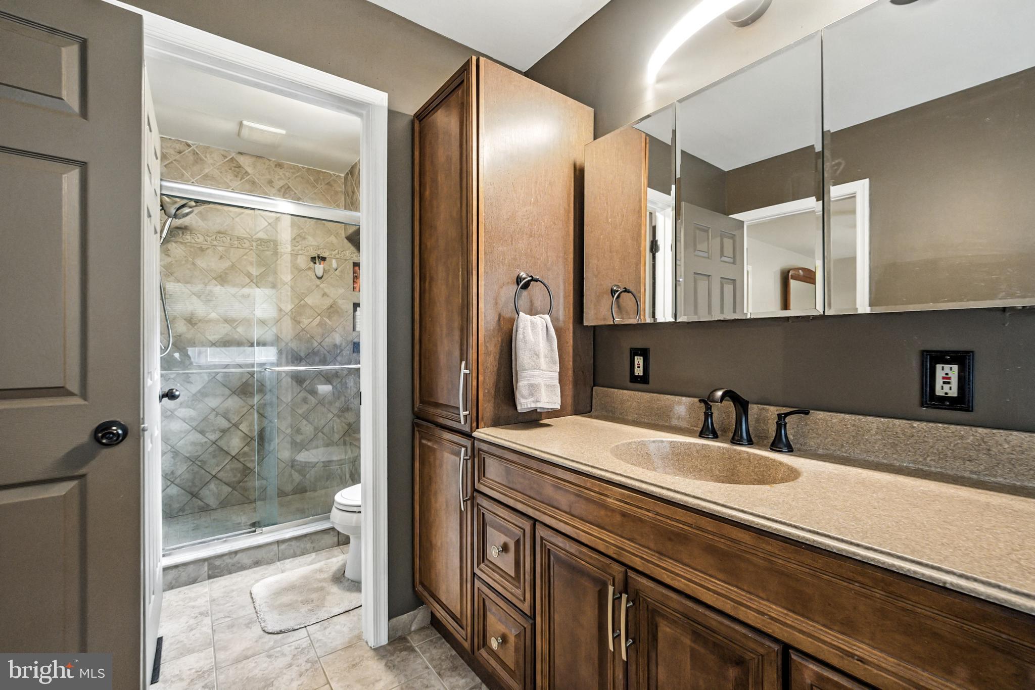 86 Pondview Lane Sicklerville, NJ 08081 - Photo 30 of 35 a bathroom with a sink and a mirror