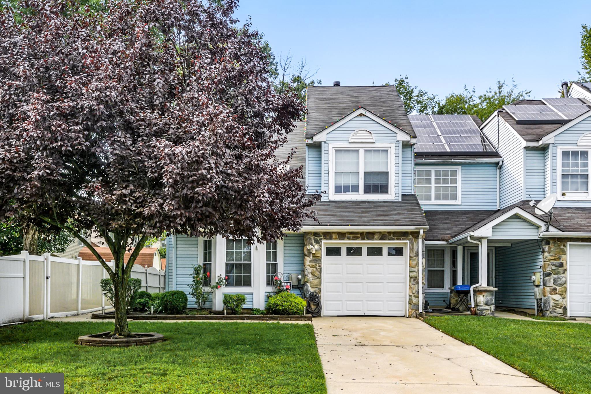 86 Pondview Lane Sicklerville, NJ 08081 - Photo 3 of 35 a front view of a house with a yard and trees