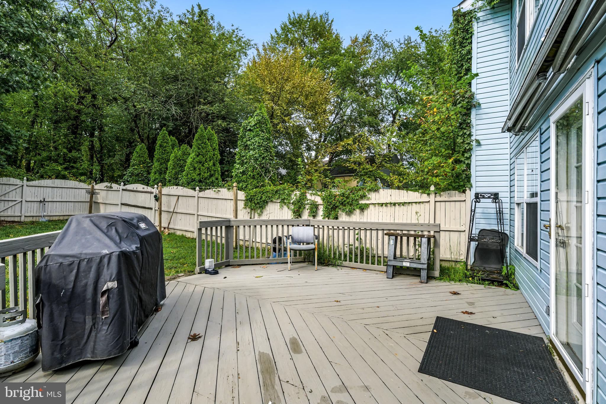 86 Pondview Lane Sicklerville, NJ 08081 - Photo 33 of 35 a view of a deck with furniture and a backyard
