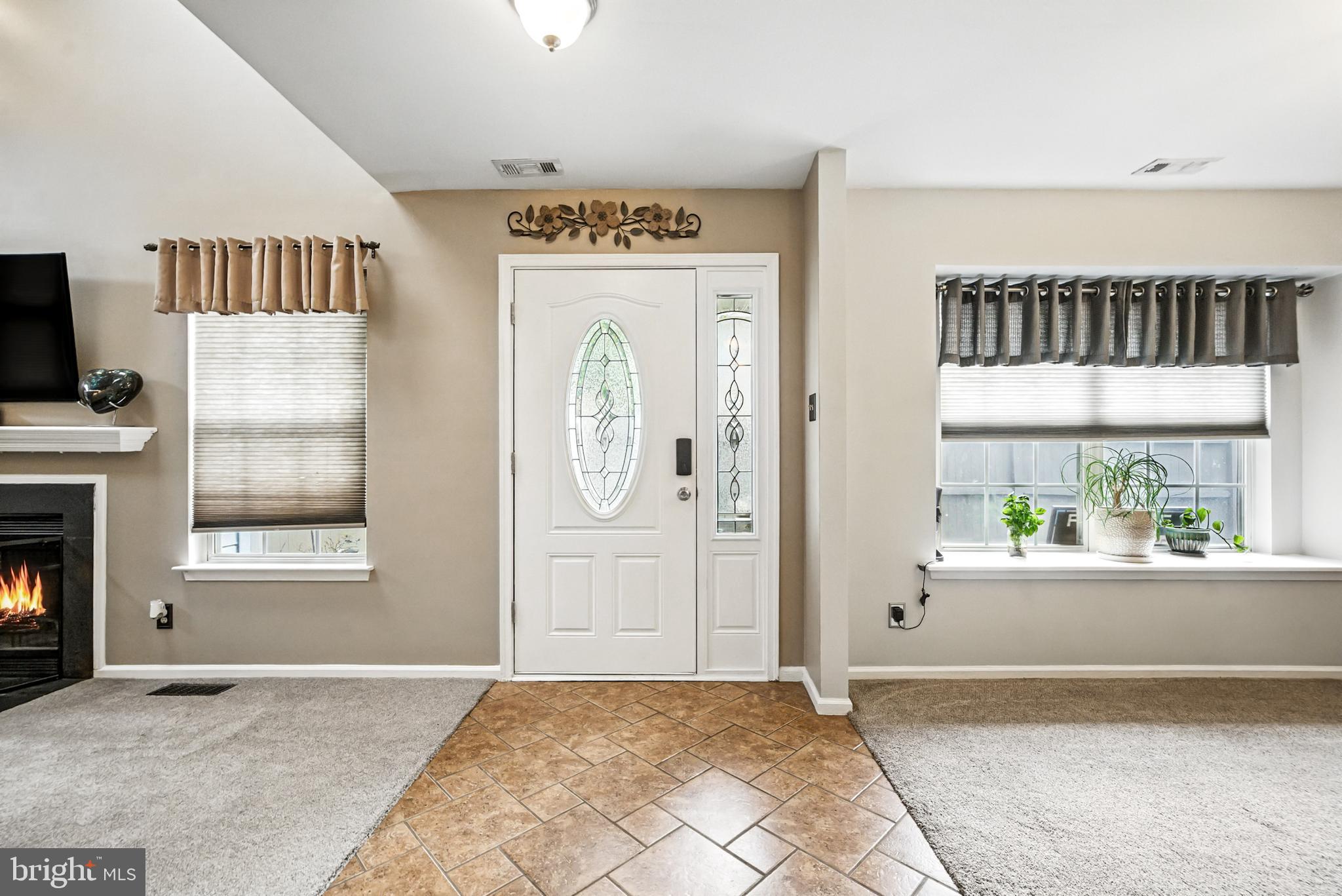 86 Pondview Lane Sicklerville, NJ 08081 - Photo 5 of 35 an empty room with windows and fireplace