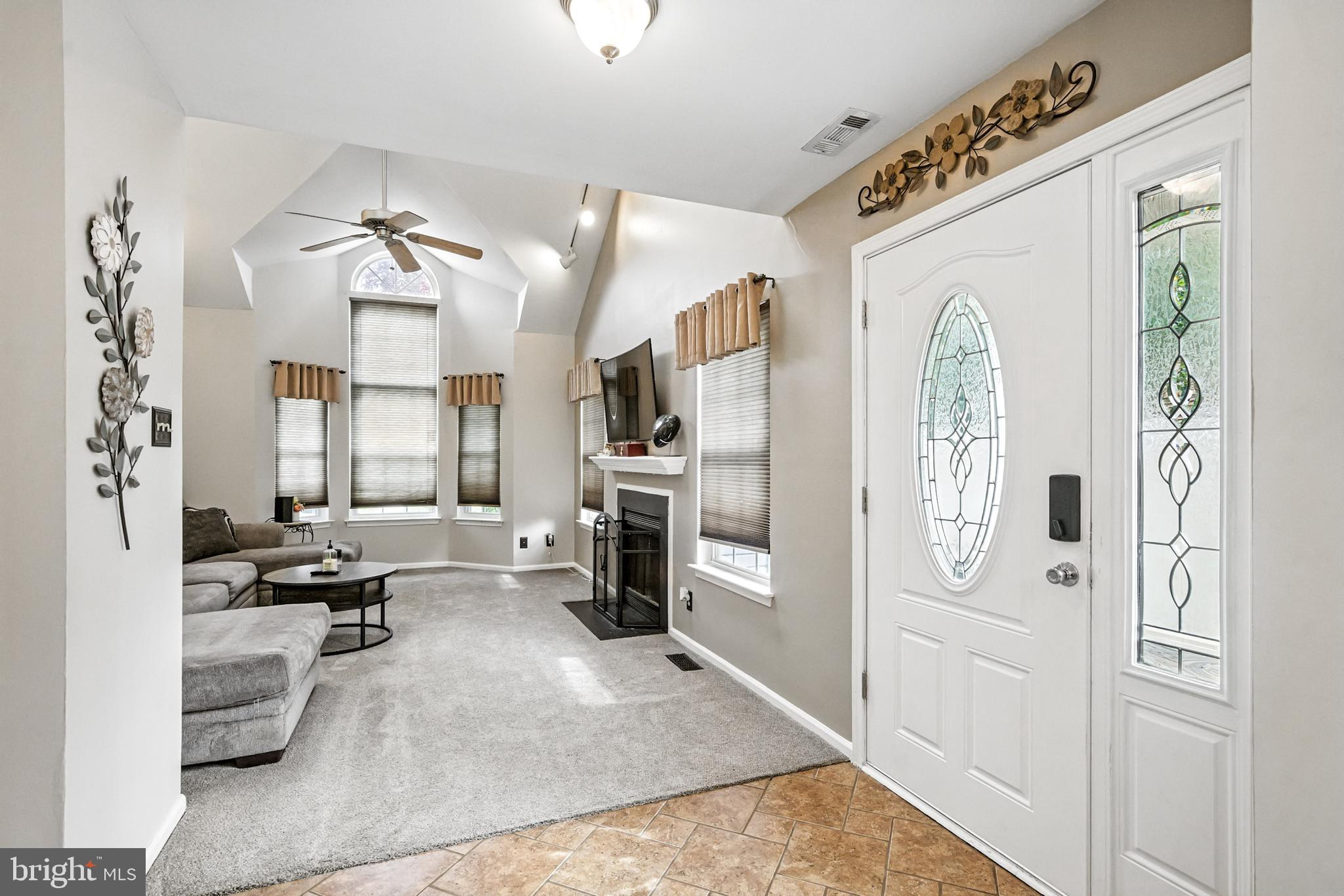 86 Pondview Lane Sicklerville, NJ 08081 - Photo 6 of 35 a living room with furniture window and a view of kitchen