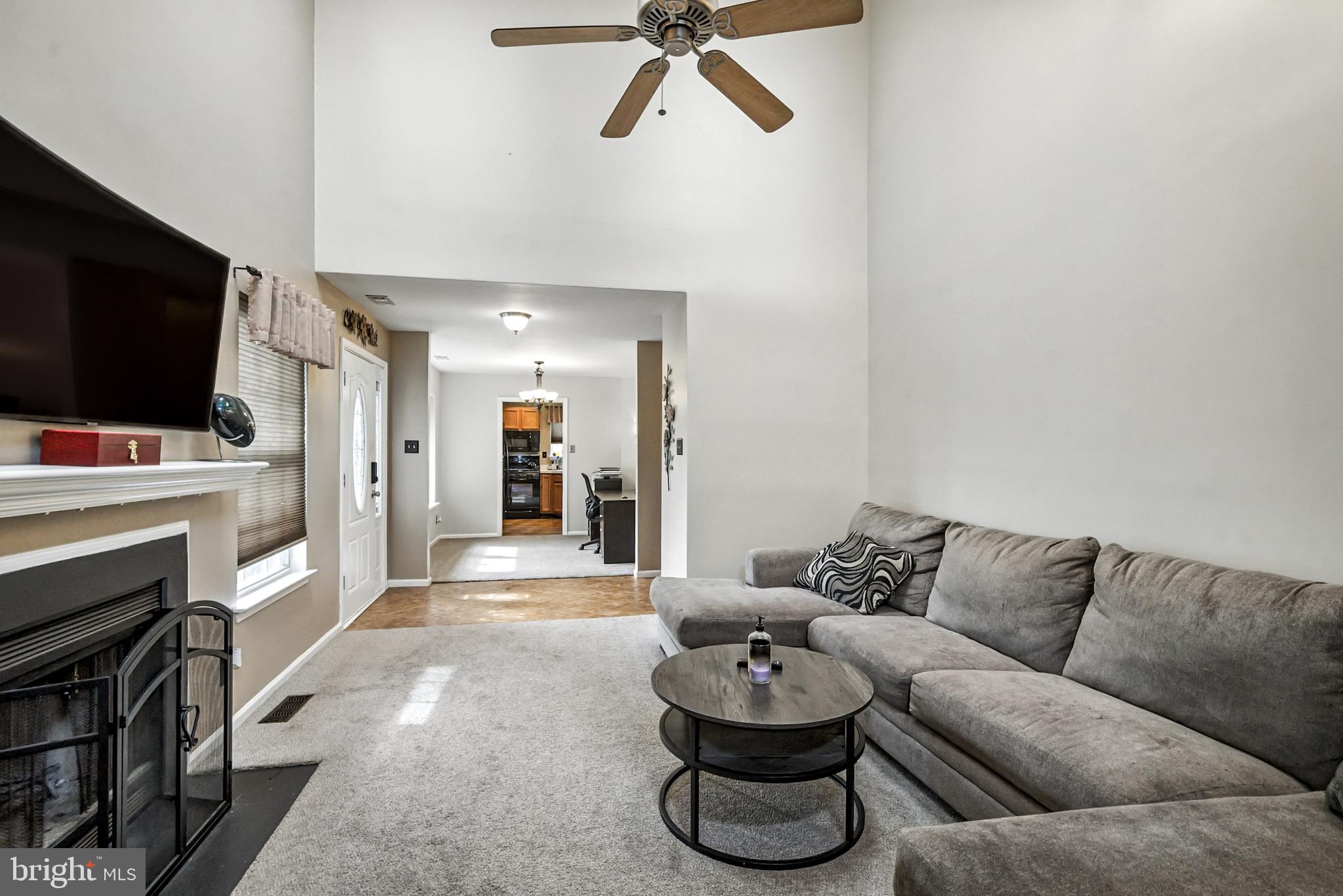 86 Pondview Lane Sicklerville, NJ 08081 - Photo 8 of 35 a living room with furniture and a flat screen tv