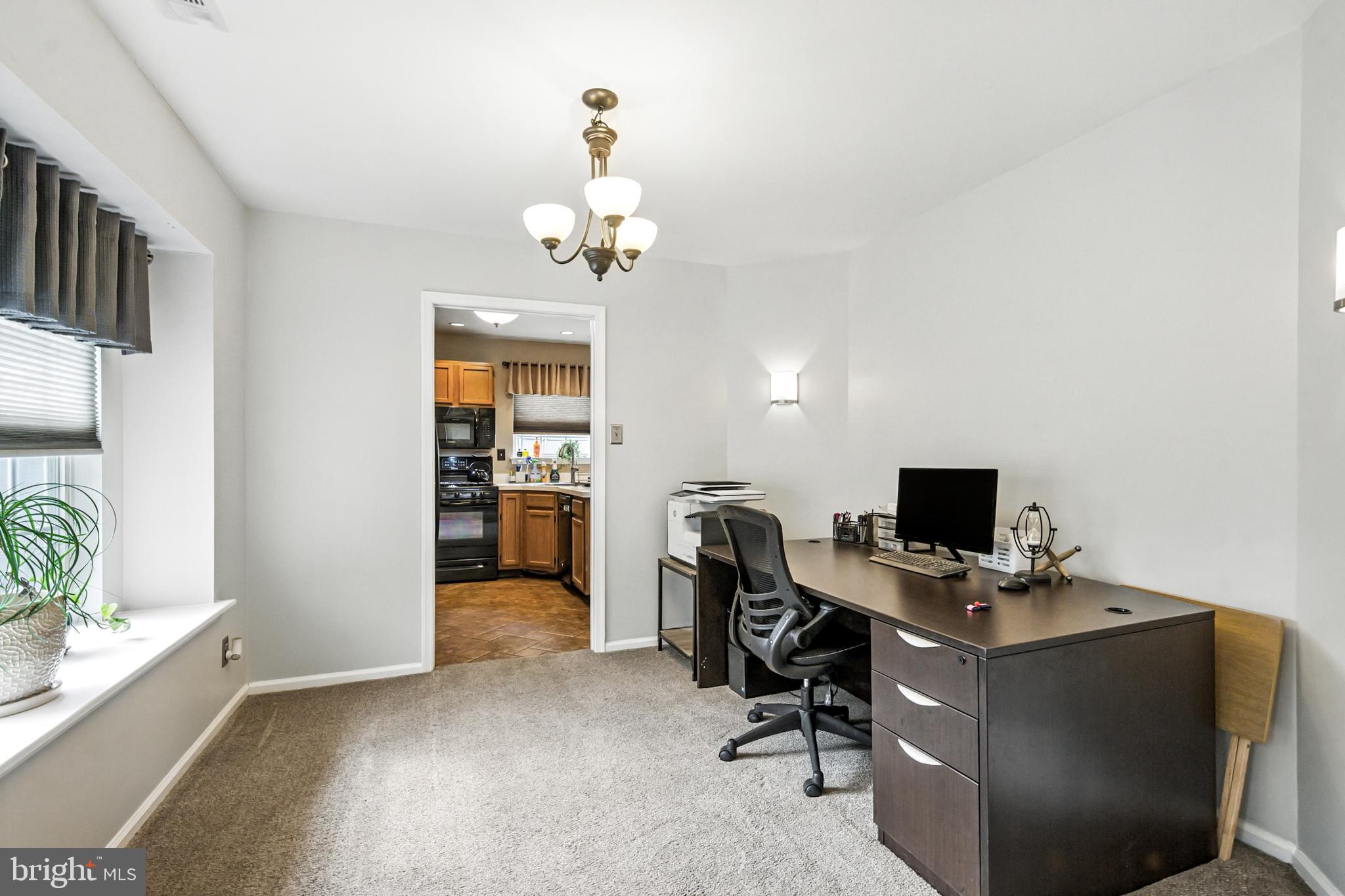 86 Pondview Lane Sicklerville, NJ 08081 - Photo 10 of 35 a view of a workspace with furniture and a window