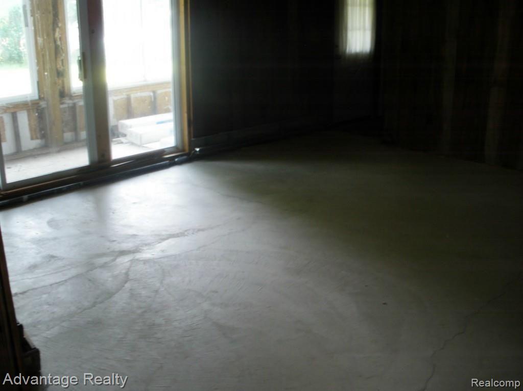 2330 North Riley Centre Memphis, MI 48041 - Photo 28 of 43 Sliding door from Great Room to narrow sun porch.
