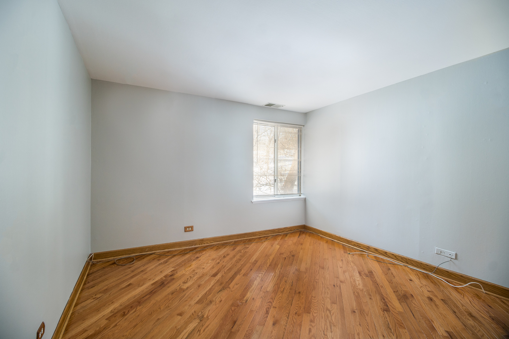 5880 Forest View Road, Unit C Lisle, IL 60532 - Photo 8 of 15 a view of empty room with wooden floor