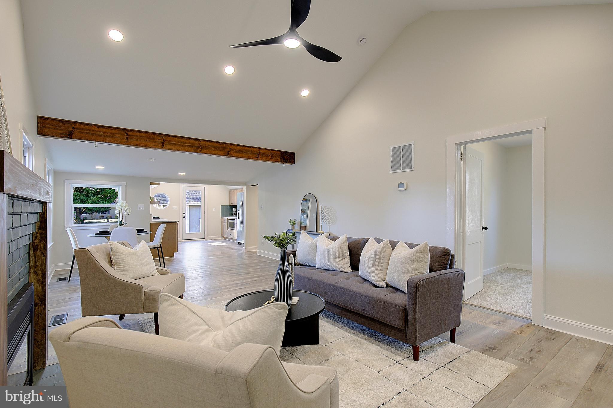 1423 Park Road Edgewater, MD 21037 - Photo 9 of 40 a living room with furniture and a ceiling fan