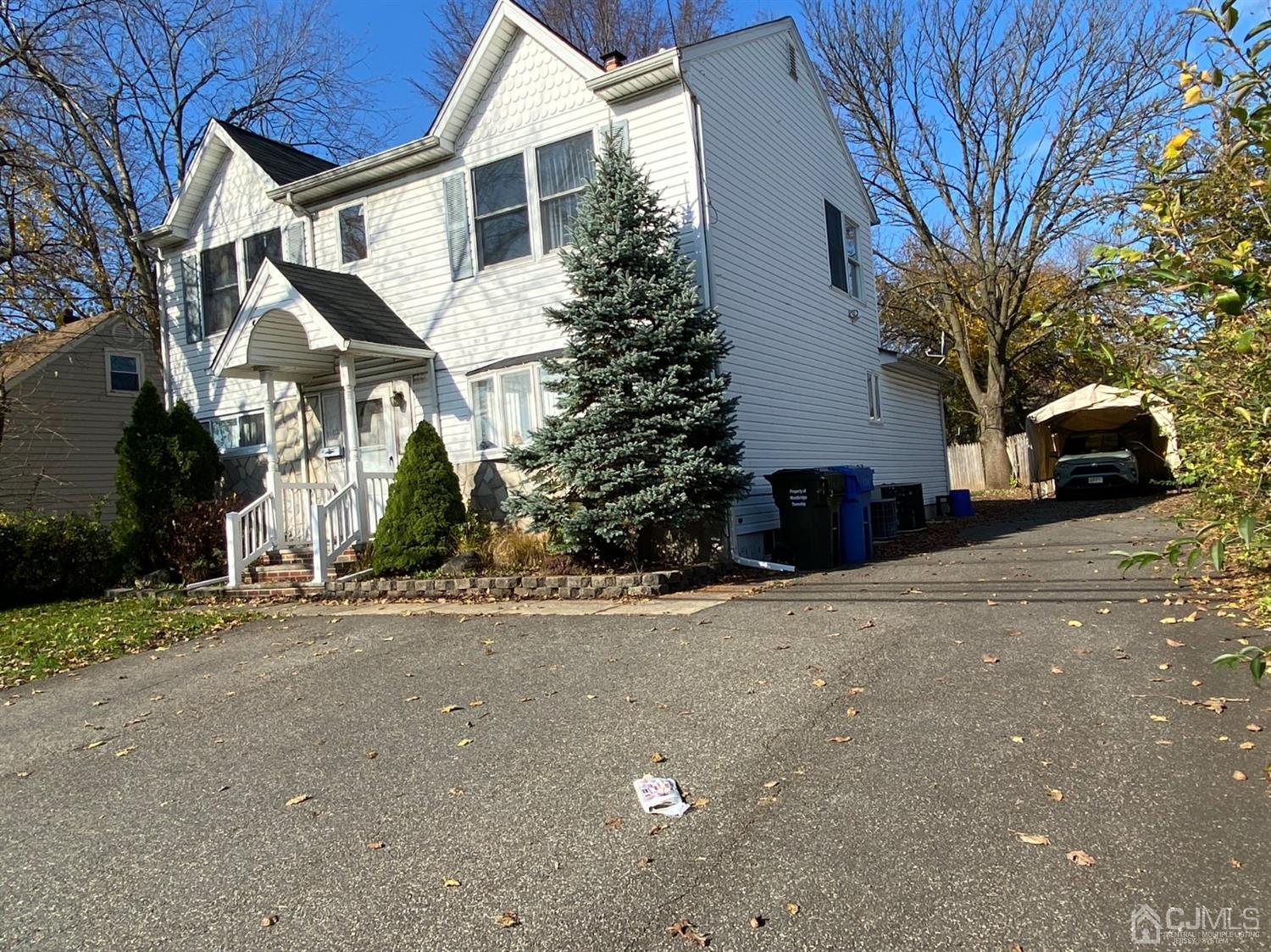 1602 Oak Tree Road Iselin, NJ 08830 - Photo 13 of 13 a view of a house with a street