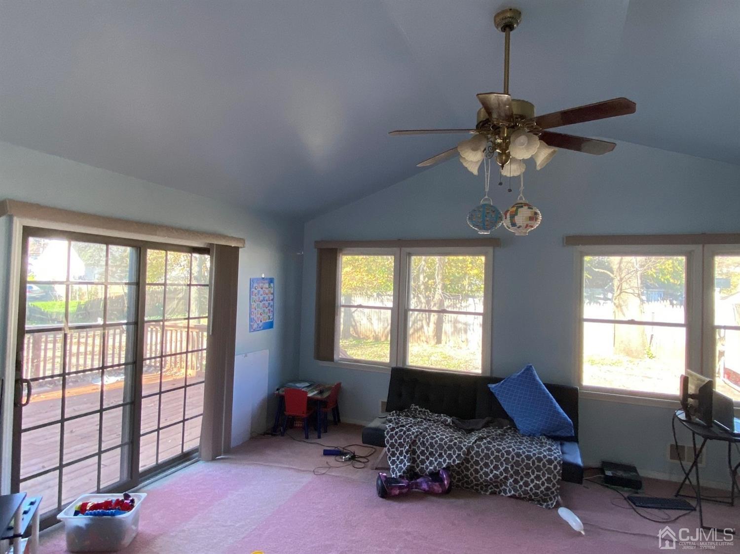 1602 Oak Tree Road Iselin, NJ 08830 - Photo 2 of 13 a living room with furniture and a window