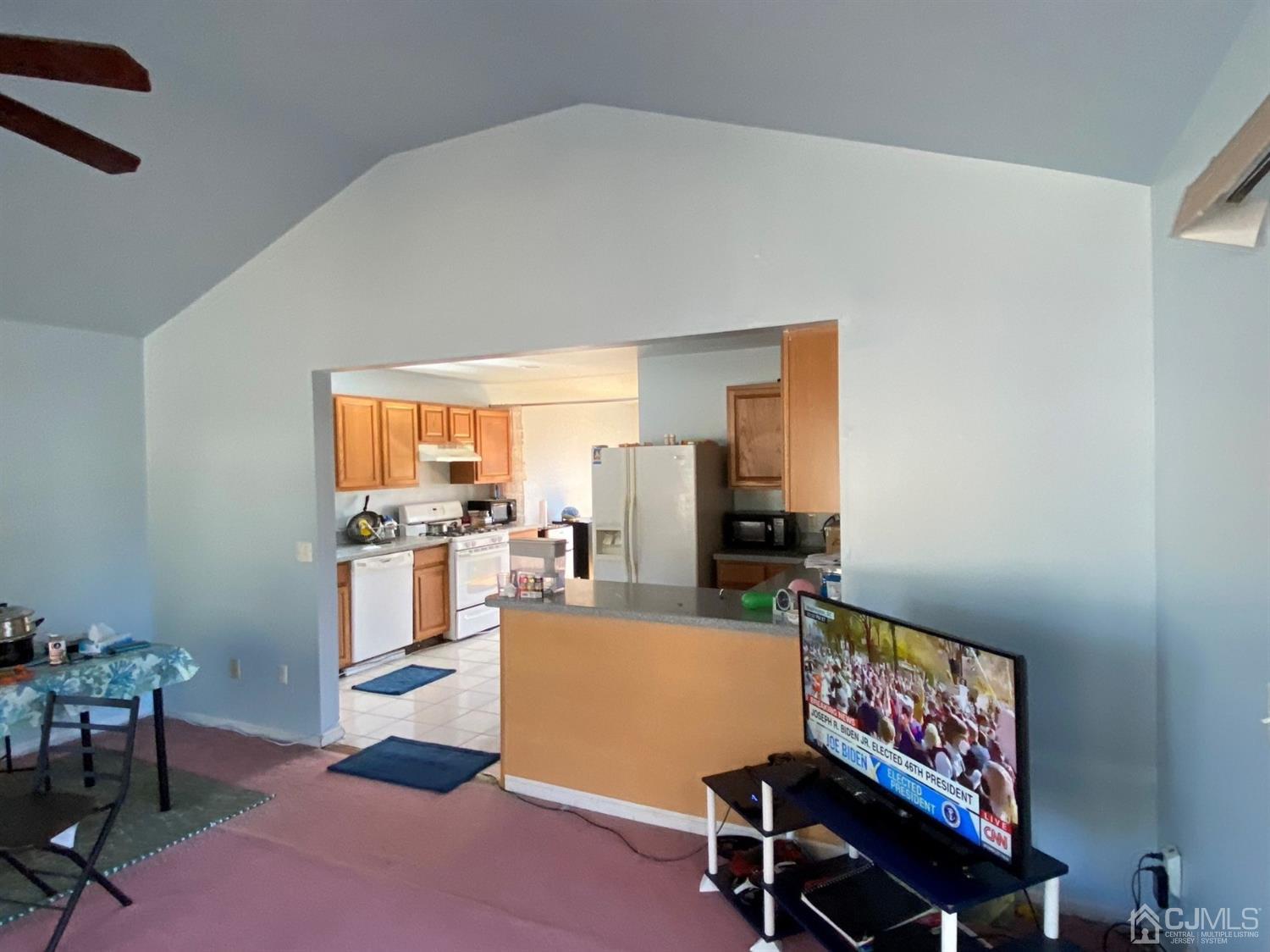1602 Oak Tree Road Iselin, NJ 08830 - Photo 5 of 13 a room with furniture and a window
