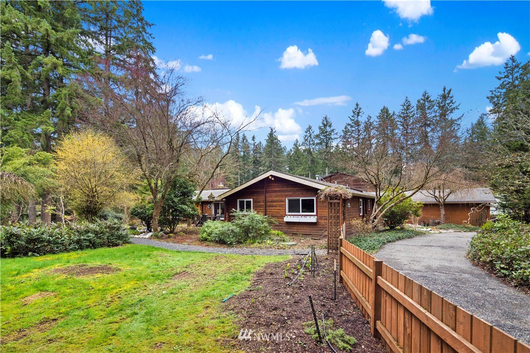 14255 183rd Avenue Southeast Renton, WA 98059 - Photo 1 of 32 a view of house with outdoor space and trees