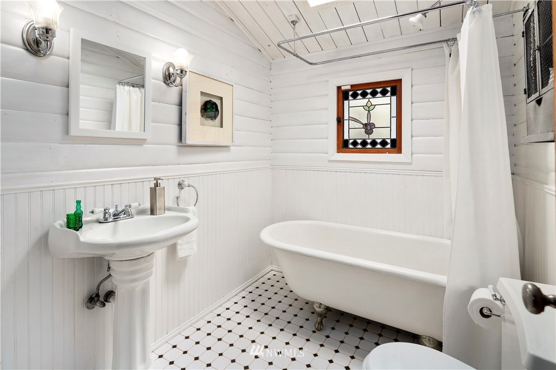 14255 183rd Avenue Southeast Renton, WA 98059 - Photo 24 of 32 a bathroom with a sink toilet and shower
