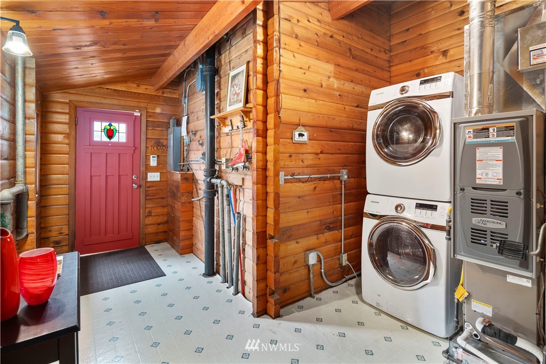 14255 183rd Avenue Southeast Renton, WA 98059 - Photo 27 of 32 a view of a storage & utility room with washer and dryer