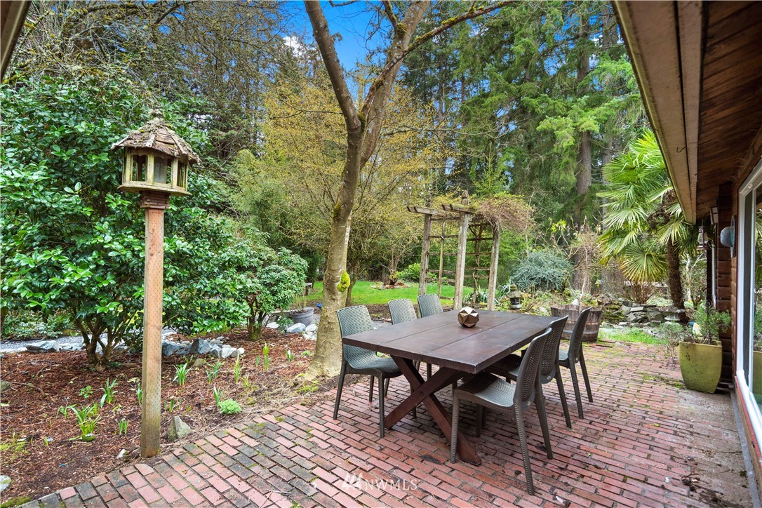 14255 183rd Avenue Southeast Renton, WA 98059 - Photo 28 of 32 a view of a patio with a table and chairs