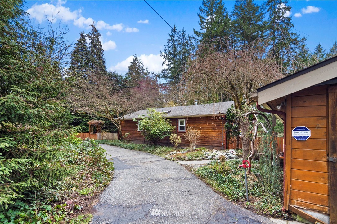 14255 183rd Avenue Southeast Renton, WA 98059 - Photo 29 of 32 a front view of a house with a yard
