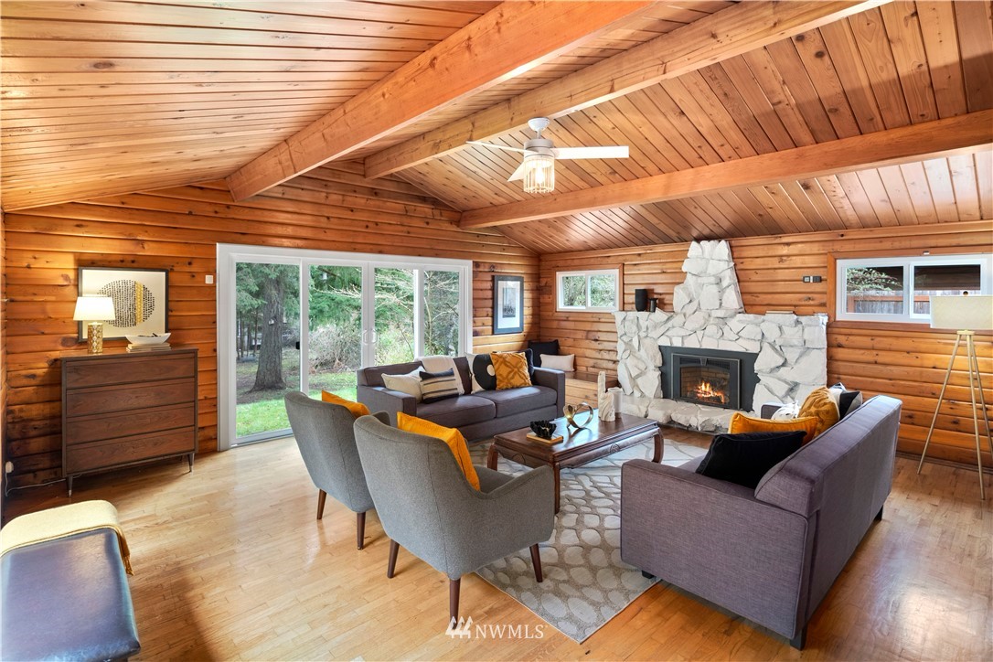 14255 183rd Avenue Southeast Renton, WA 98059 - Photo 3 of 32 a living room with furniture and a fireplace