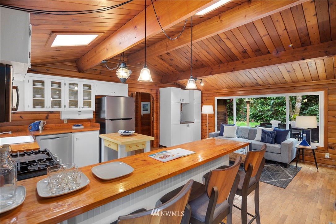 14255 183rd Avenue Southeast Renton, WA 98059 - Photo 10 of 32 a kitchen with a table and chairs in it
