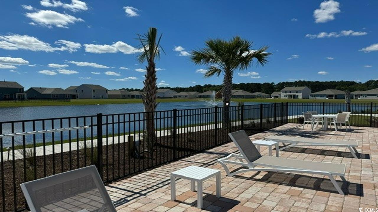 4037 Elmridge Court Conway, SC 29526 - Photo 25 of 29 View of patio / terrace featuring a residential view, a water view, and outdoor dining area