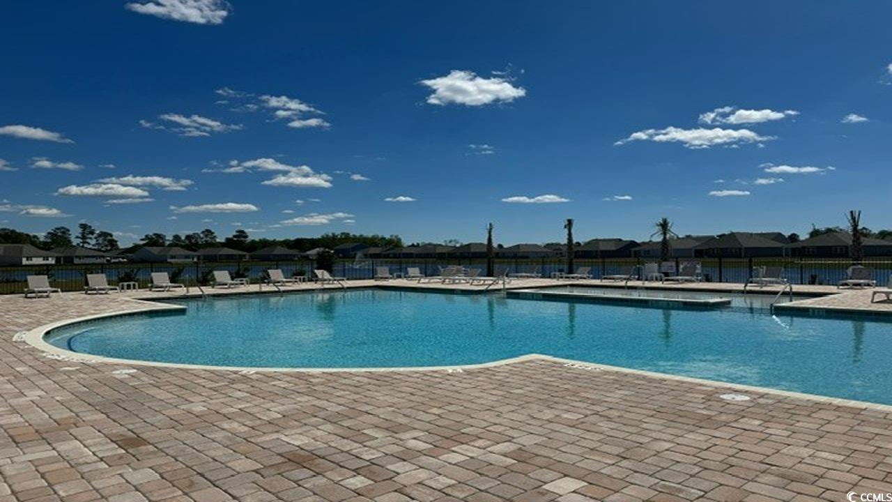 4037 Elmridge Court Conway, SC 29526 - Photo 27 of 29 Community pool featuring a patio