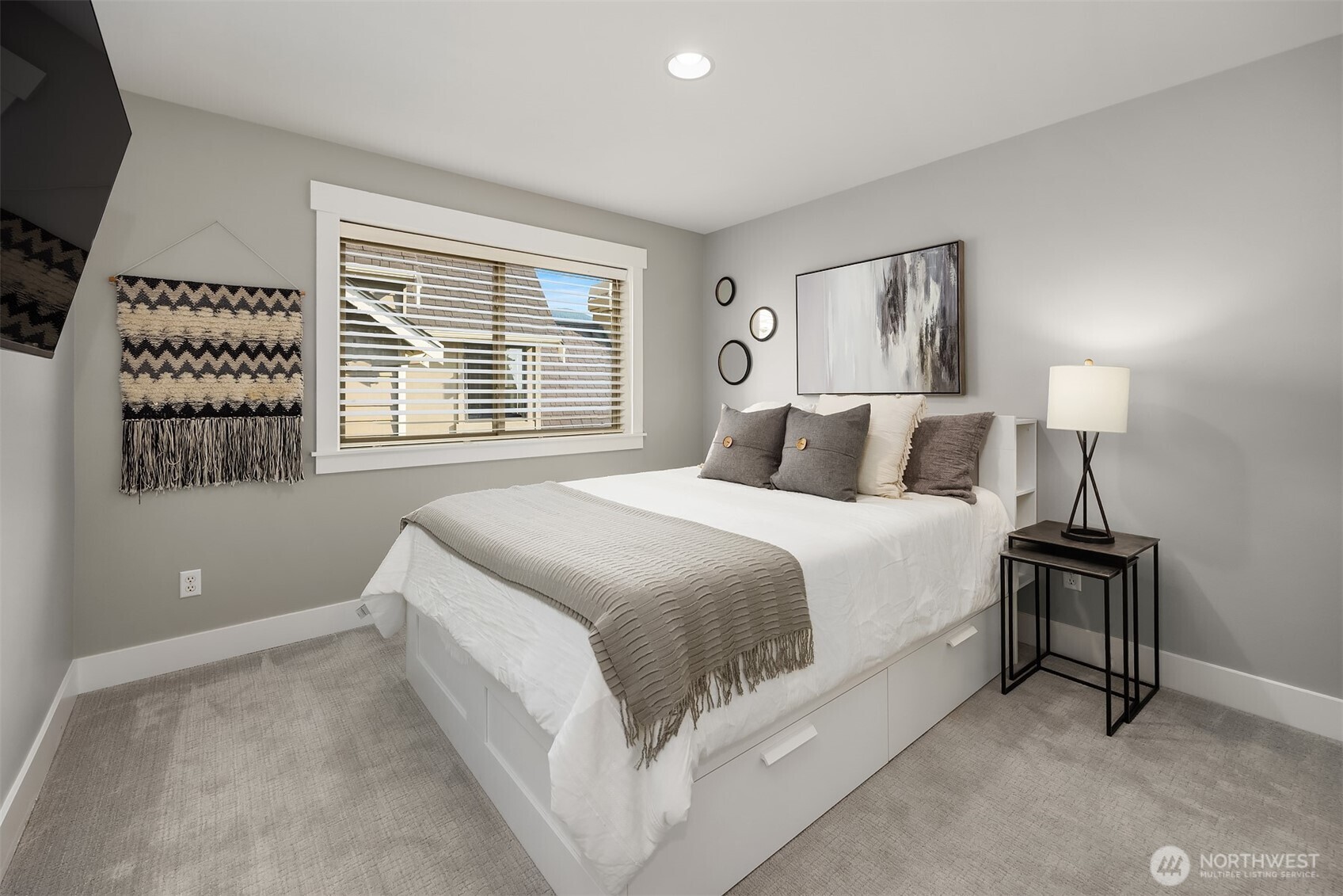 2989 Northeast Davis Loop Issaquah, WA 98029 - Photo 27 of 40 a bedroom with a bed and a window