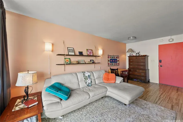 a living room with furniture and a couch