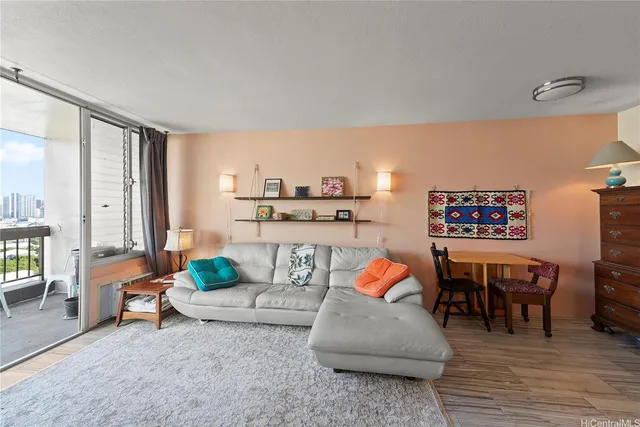 a living room with furniture and a table