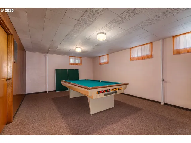 a room with furniture and window