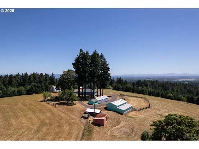 a backyard of a house with outdoor seating
