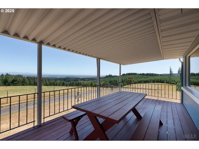 a view of deck with wooden floor and outdoor seating