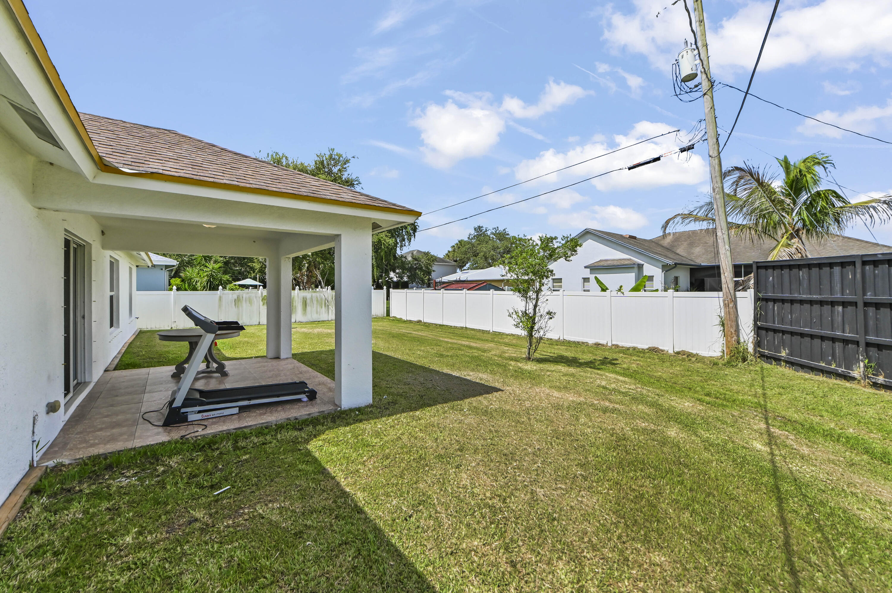 2194 Southwest Salmon Road Port St. Lucie, FL 34953 - Photo 22 of 29 30 Backyard 01