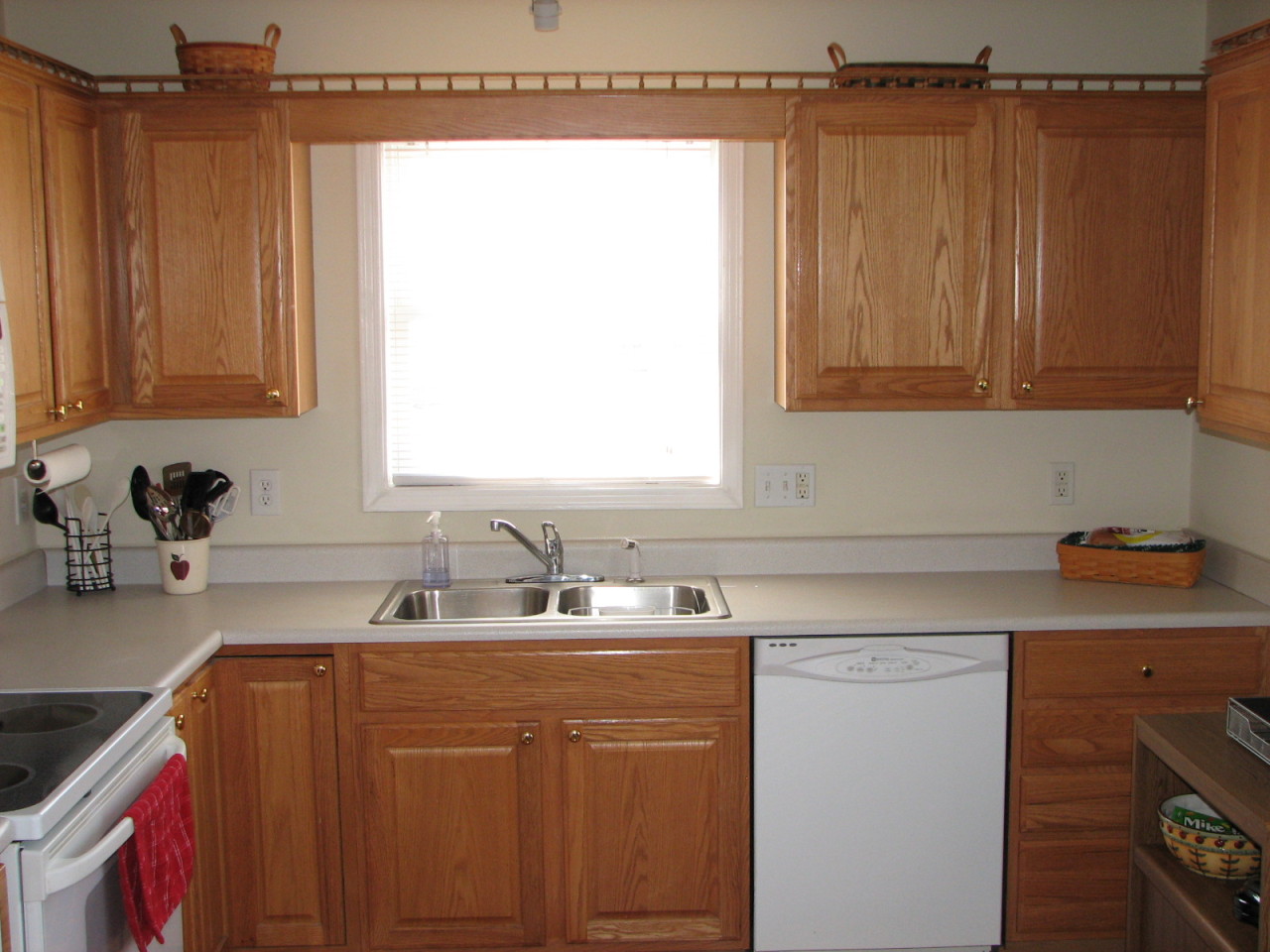 1715 Meadows Road Vinton, VA 24179 - Photo 13 of 37 a kitchen with a sink cabinets and a window