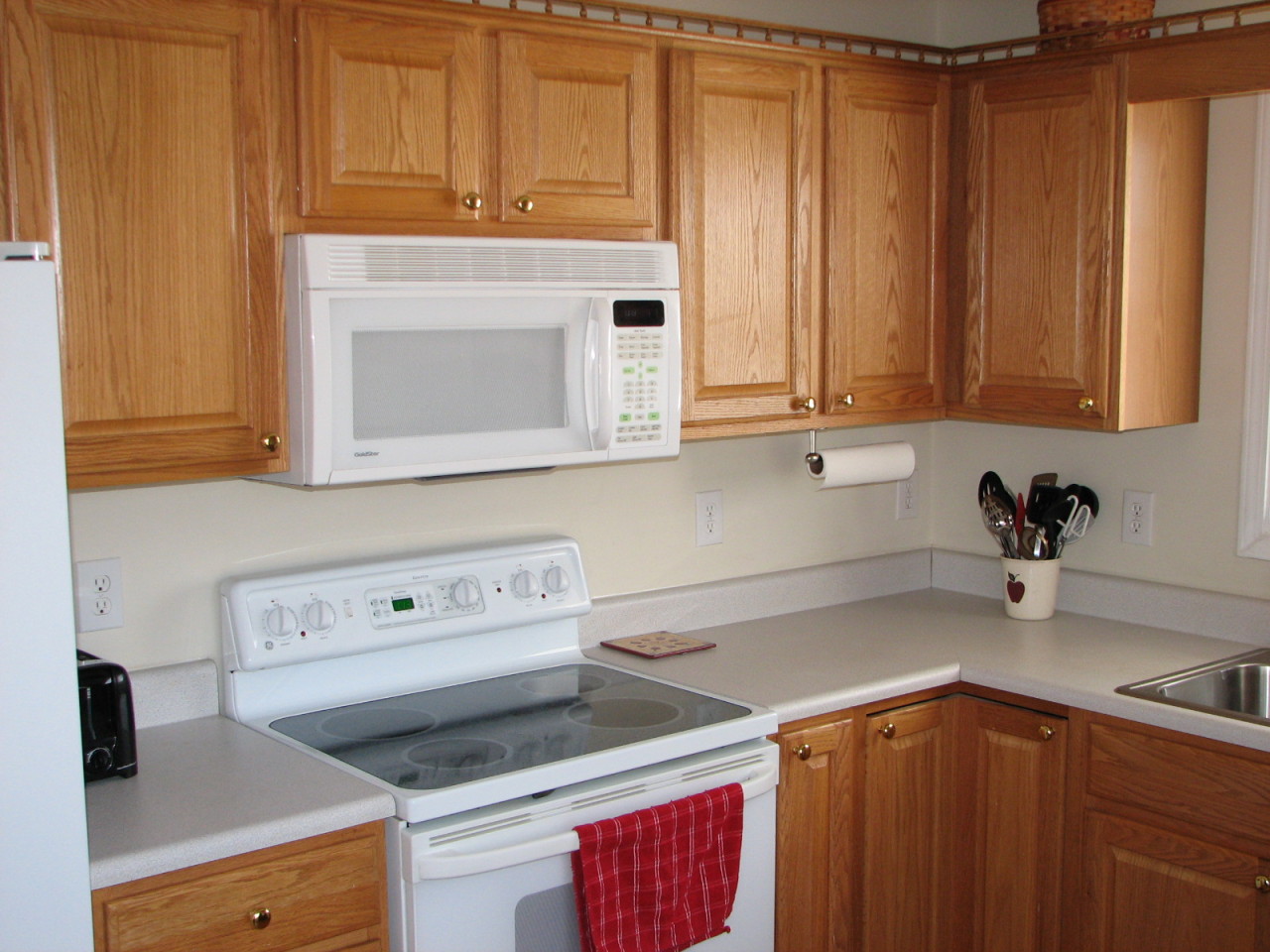 1715 Meadows Road Vinton, VA 24179 - Photo 14 of 37 a kitchen with a sink cabinets and appliances