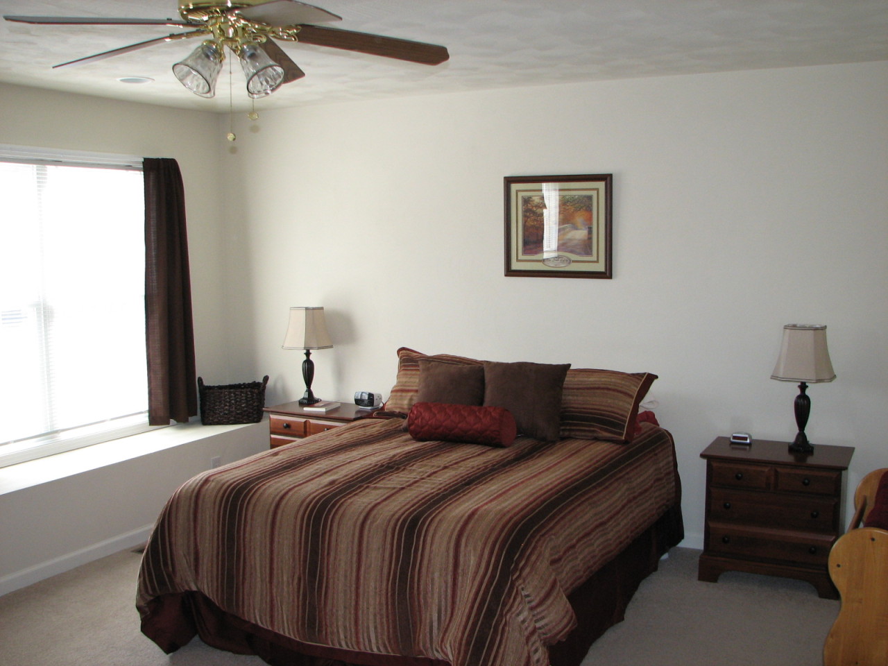 1715 Meadows Road Vinton, VA 24179 - Photo 16 of 37 a bedroom with a bed and a chandelier