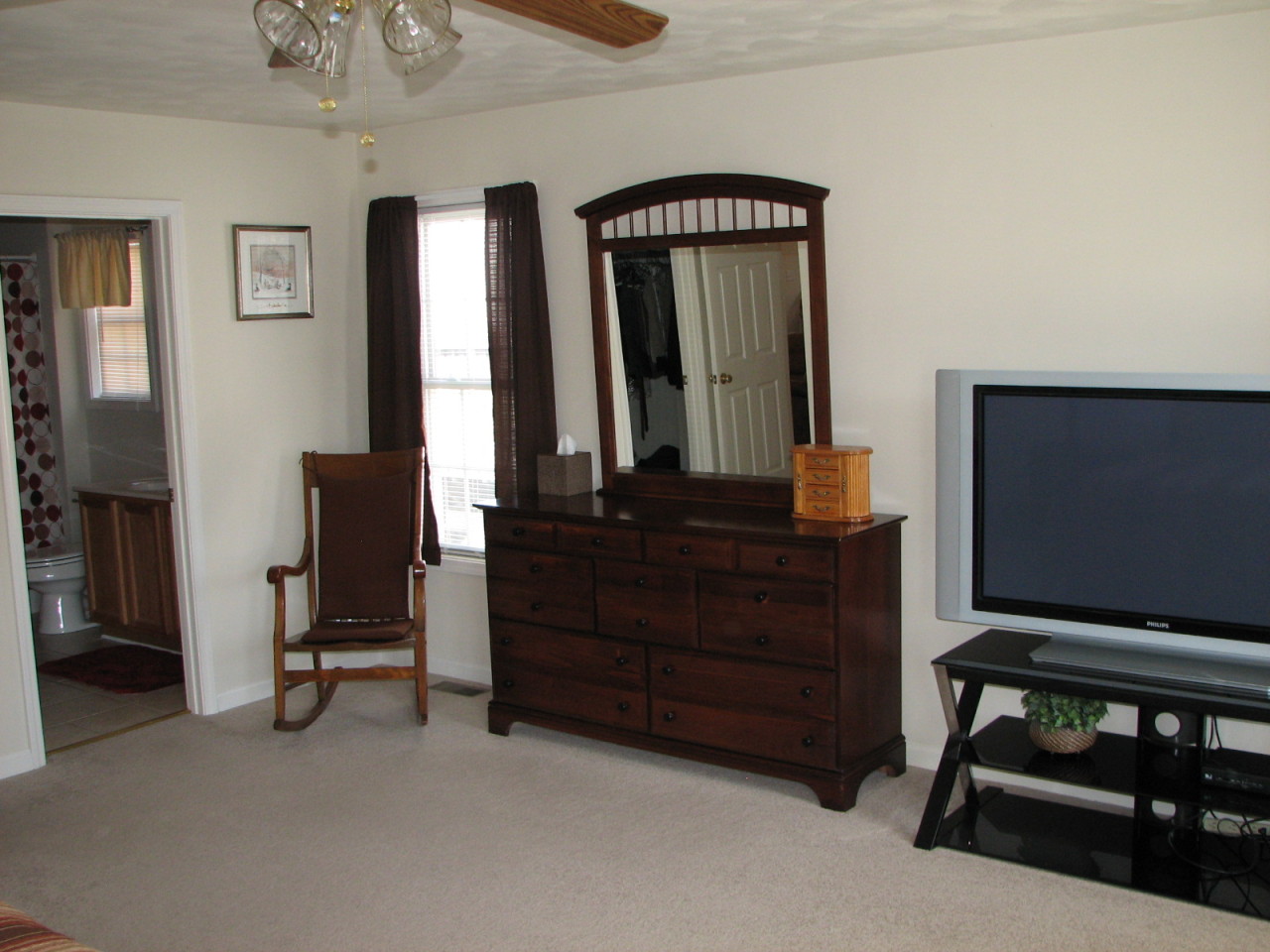1715 Meadows Road Vinton, VA 24179 - Photo 19 of 37 a living room with furniture and a flat screen tv