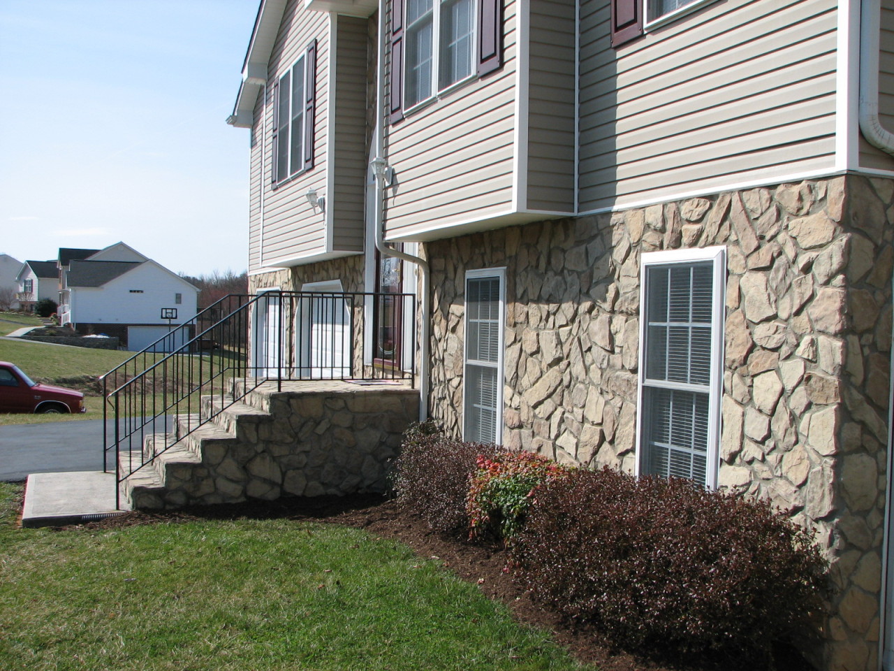 1715 Meadows Road Vinton, VA 24179 - Photo 3 of 37 a front view of a house with a garden